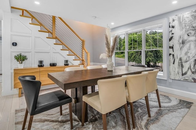 34 Cedar St, Hopkinton, MA 01748 - dining room with stairway, healthy amount of natural light, recessed lighting, and wood finished floors