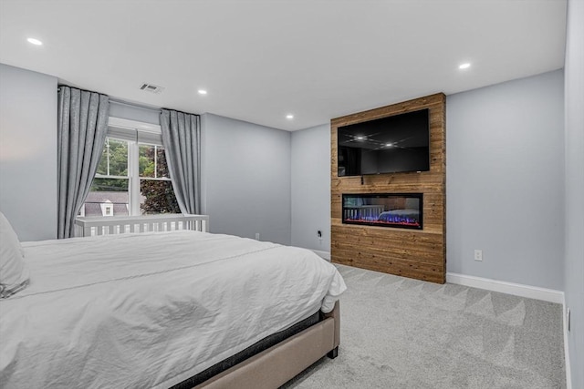 34 Cedar St, Hopkinton, MA 01748 - bedroom with recessed lighting, carpet flooring, and a glass covered fireplace