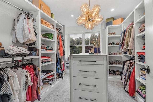 34 Cedar St, Hopkinton, MA 01748 - walk in closet with light carpet and a chandelier