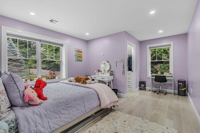 34 Cedar St, Hopkinton, MA 01748 - bedroom with light wood-type flooring and recessed lighting