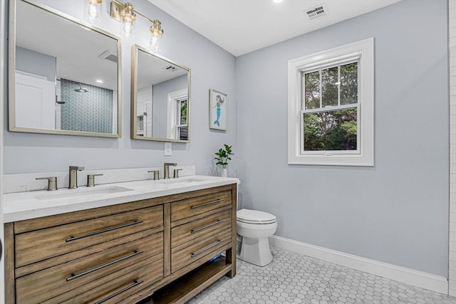 34 Cedar St, Hopkinton, MA 01748 - bathroom featuring double vanity and a tile shower