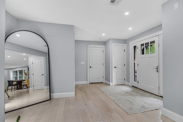 34 Cedar St, Hopkinton, MA 01748 - foyer entrance featuring light wood-style floors and recessed lighting