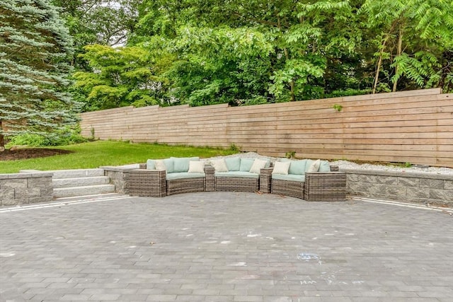 34 Cedar St, Hopkinton, MA 01748 - fenced backyard featuring an outdoor living space and a patio