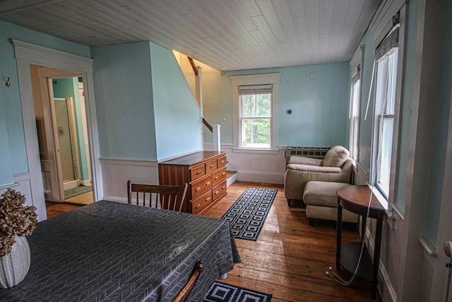 301 Main St, Dennis, MA 02639 - bedroom with hardwood / wood-style floors, a wainscoted wall, and wooden ceiling