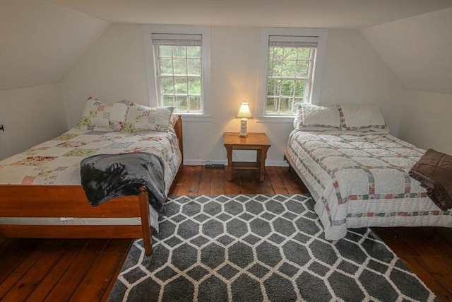 301 Main St, Dennis, MA 02639 - bedroom featuring hardwood / wood-style flooring, multiple windows, and lofted ceiling