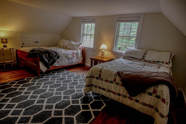 301 Main St, Dennis, MA 02639 - bedroom featuring wood-type flooring, lofted ceiling, and baseboards