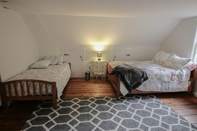 301 Main St, Dennis, MA 02639 - bedroom with wood-type flooring and vaulted ceiling