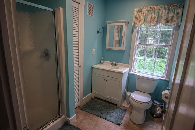 301 Main St, Dennis, MA 02639 - full bathroom with a shower stall, a closet, vanity, and tile patterned flooring