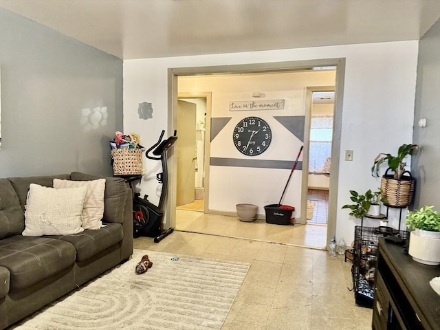 living area featuring tile patterned floors