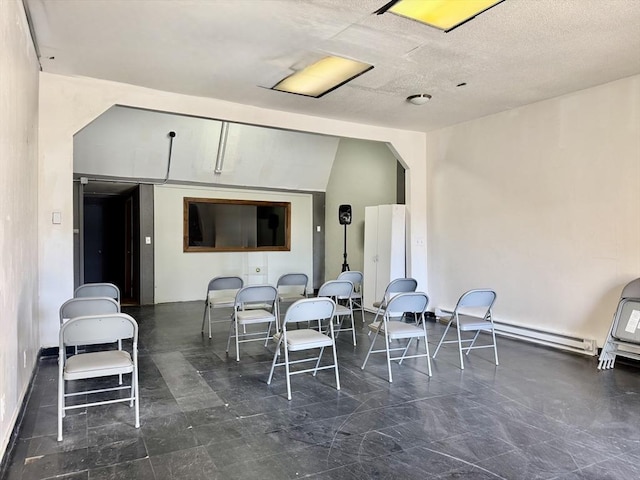 view of patio featuring a baseboard heating unit