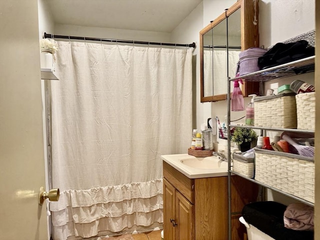 full bath with tile patterned floors, vanity, and a shower with curtain