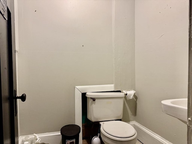 bathroom featuring toilet