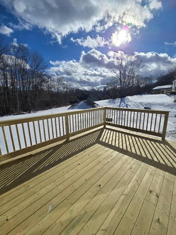 view of snow covered deck