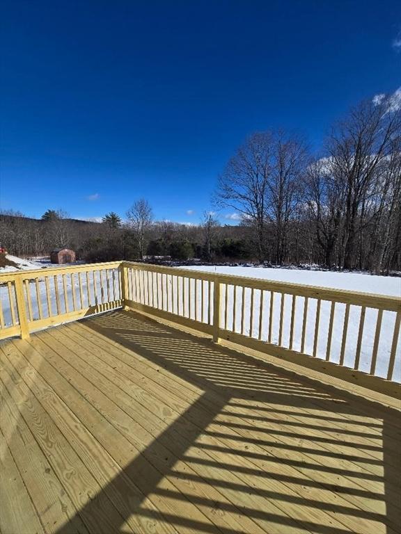 view of snow covered deck