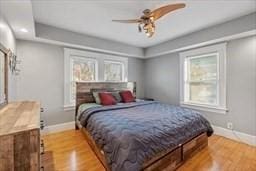 bedroom featuring ceiling fan and light hardwood / wood-style floors