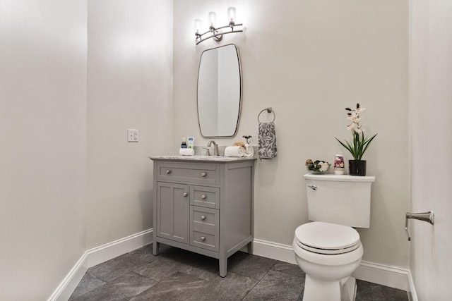 453 Forest St, North Andover, MA 01845 - bathroom featuring baseboards and vanity