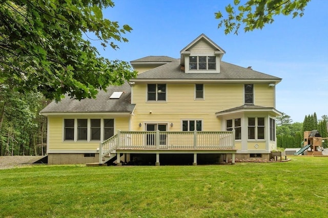 453 Forest St, North Andover, MA 01845 - rear view of house with a playground, a deck, a yard, roof with shingles, and crawl space