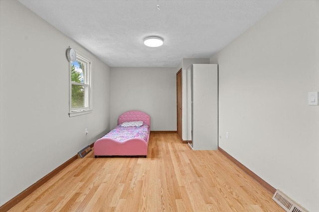 46 Lisa Ln, Methuen, MA 01844 - bedroom featuring light wood-style flooring and baseboards