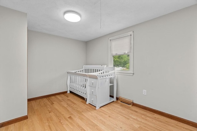 46 Lisa Ln, Methuen, MA 01844 - bedroom featuring light wood-style flooring and baseboards
