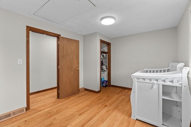 46 Lisa Ln, Methuen, MA 01844 - bedroom with attic access and light wood-style flooring