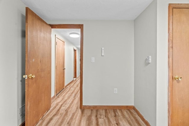 46 Lisa Ln, Methuen, MA 01844 - hall featuring light wood-type flooring and baseboards