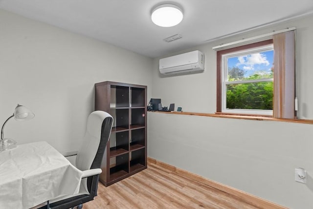 46 Lisa Ln, Methuen, MA 01844 - office area with an AC wall unit and light wood-type flooring
