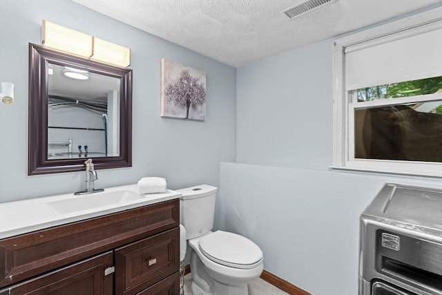 46 Lisa Ln, Methuen, MA 01844 - bathroom featuring vanity, washer / dryer, and a textured ceiling