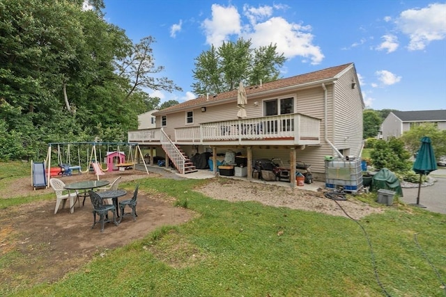 46 Lisa Ln, Methuen, MA 01844 - back of house featuring a deck, a playground, a yard, and stairway