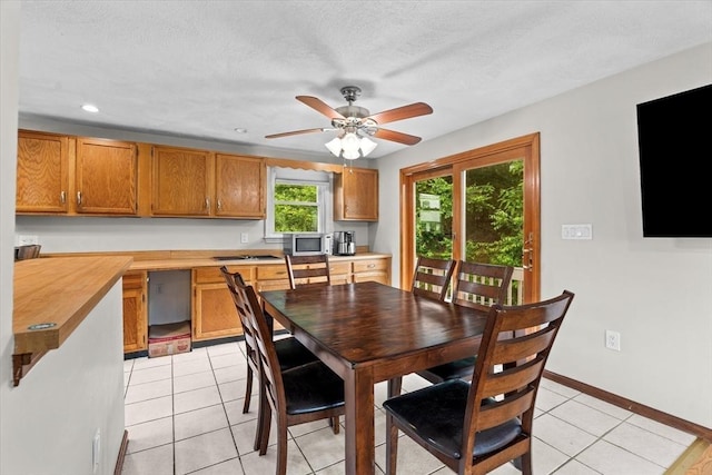 46 Lisa Ln, Methuen, MA 01844 - dining space with light tile patterned flooring, ceiling fan, and recessed lighting