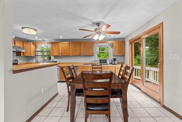 46 Lisa Ln, Methuen, MA 01844 - dining area featuring light tile patterned flooring and ceiling fan