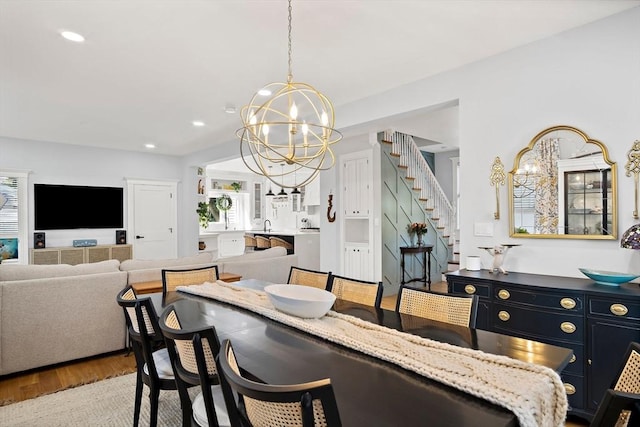 38 Thatcher St, Medford, MA 02155 - dining area with a chandelier, stairway, wood finished floors, and recessed lighting