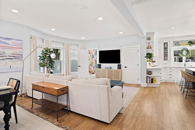 38 Thatcher St, Medford, MA 02155 - living area with light wood finished floors and recessed lighting