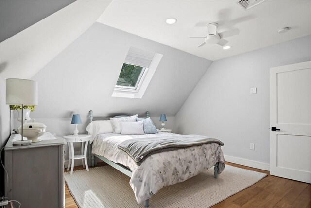 38 Thatcher St, Medford, MA 02155 - bedroom with a skylight, lofted ceiling, light wood-style flooring, a ceiling fan, and recessed lighting