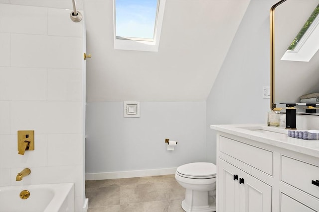38 Thatcher St, Medford, MA 02155 - bathroom with a skylight, plenty of natural light, vanity, and lofted ceiling
