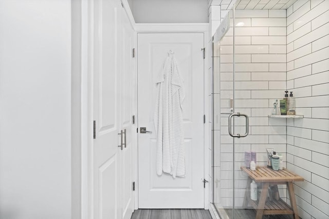 full bathroom with a shower stall