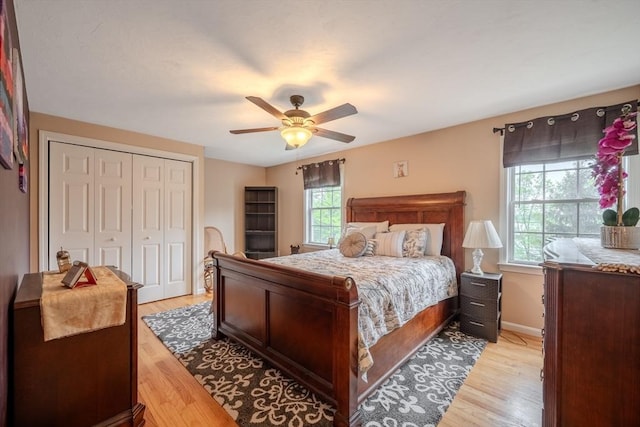 36 Westford Rd, Ayer, MA 01432 - bedroom featuring light wood-type flooring, a closet, ceiling fan, and baseboards
