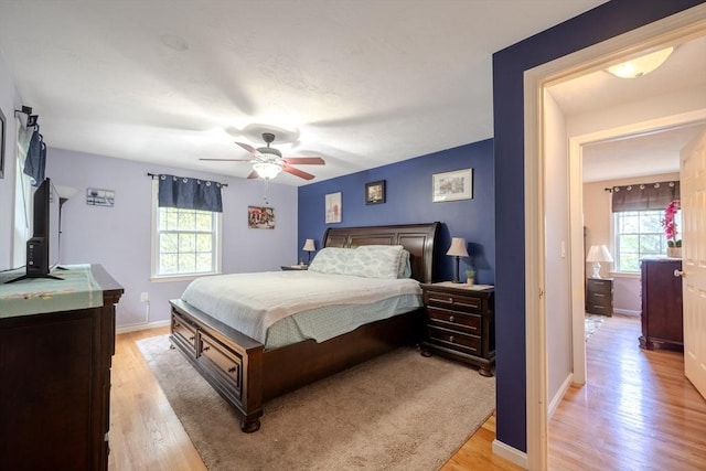 36 Westford Rd, Ayer, MA 01432 - bedroom with light wood-style floors, baseboards, and ceiling fan