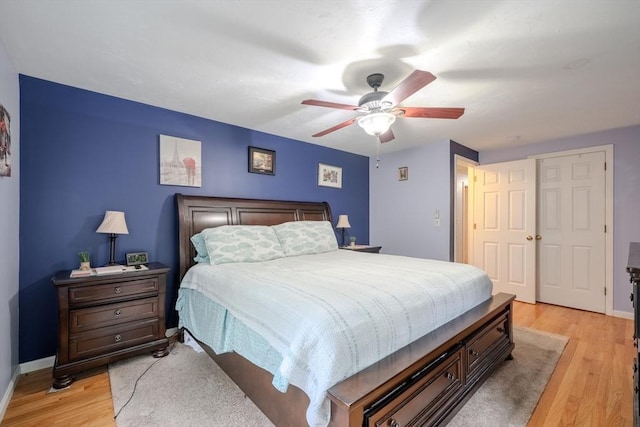 36 Westford Rd, Ayer, MA 01432 - bedroom featuring light wood-type flooring, baseboards, a closet, and ceiling fan