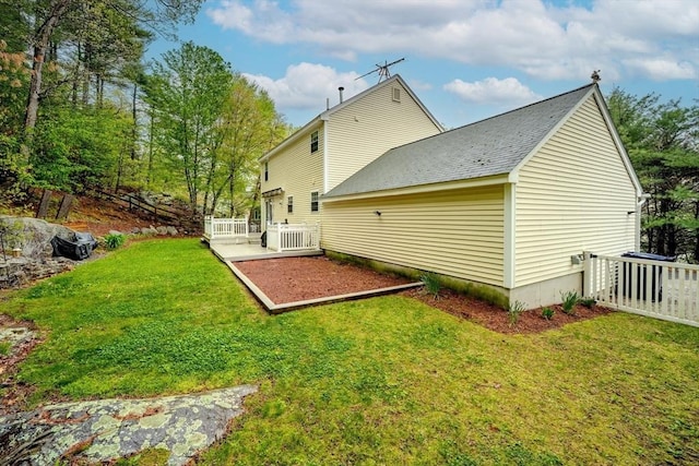 36 Westford Rd, Ayer, MA 01432 - back of property with a deck and a yard