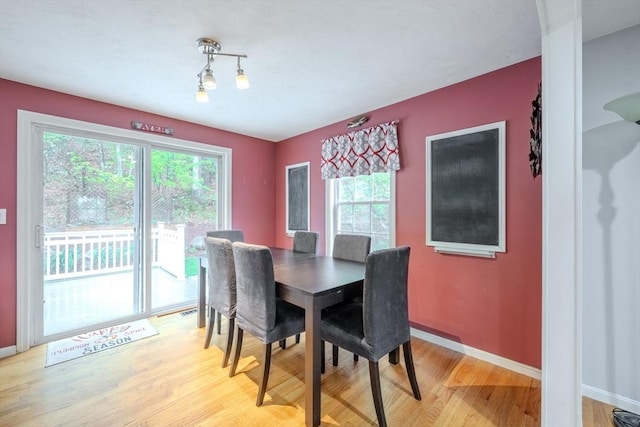 36 Westford Rd, Ayer, MA 01432 - dining room with light wood finished floors and baseboards