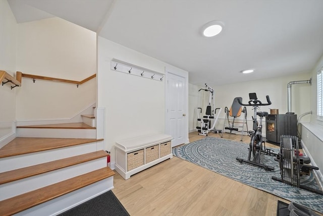 workout area featuring wood finished floors
