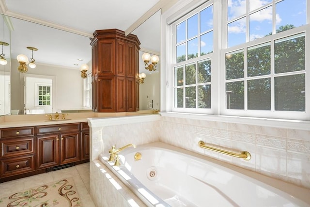 full bath with ornamental molding, vanity, a whirlpool tub, and tile patterned floors