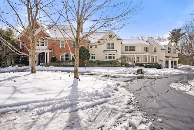 view of front of house with brick siding