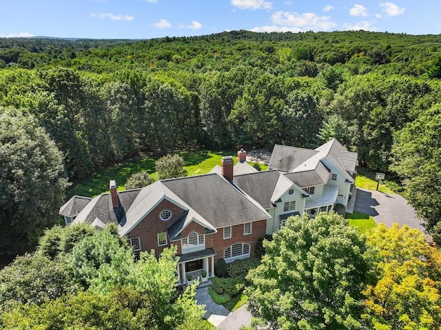 bird's eye view with a view of trees