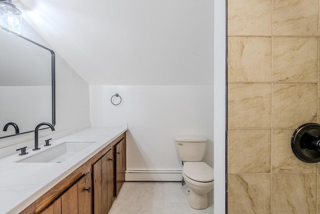 bathroom featuring tile patterned floors, toilet, a baseboard radiator, lofted ceiling, and vanity