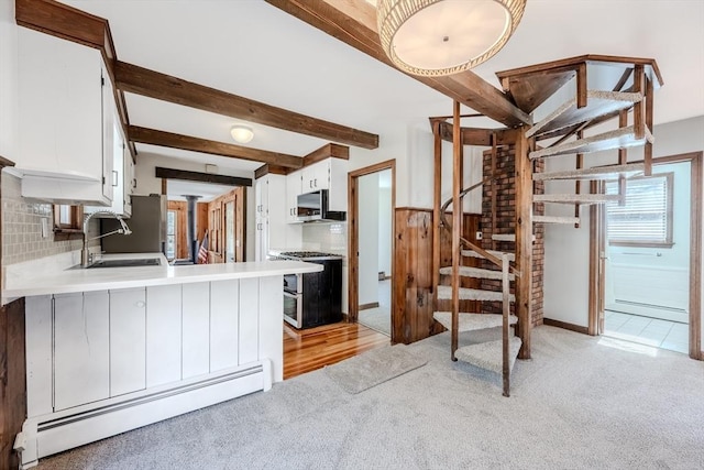 kitchen with stainless steel microwave, beamed ceiling, double oven range, a baseboard radiator, and a sink