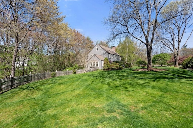 view of yard with fence