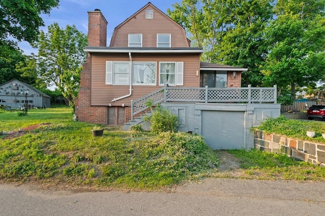 295 Rock Island Rd, Quincy, MA 02169 - dutch colonial with a gambrel roof, a chimney, a garage, and stairs