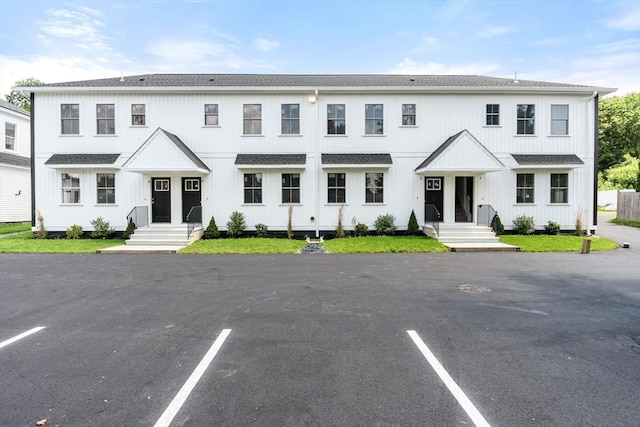 50 Frankfort St Unit 1, Fitchburg, MA 01420 - view of property with uncovered parking and a shingled roof