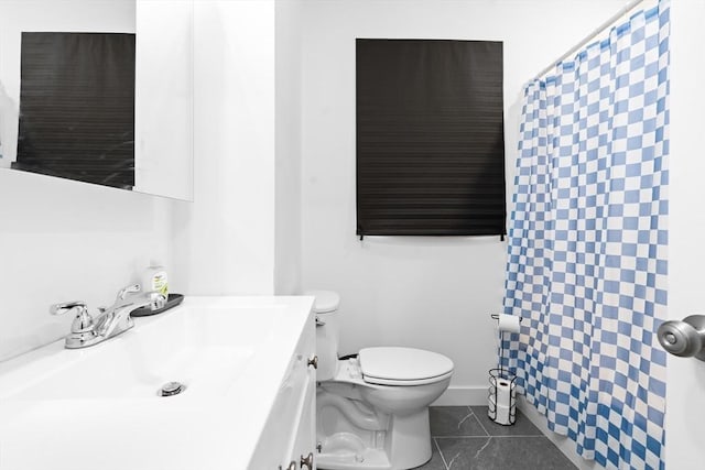 50 Frankfort St Unit 1, Fitchburg, MA 01420 - full bath with toilet, vanity, and tile patterned flooring